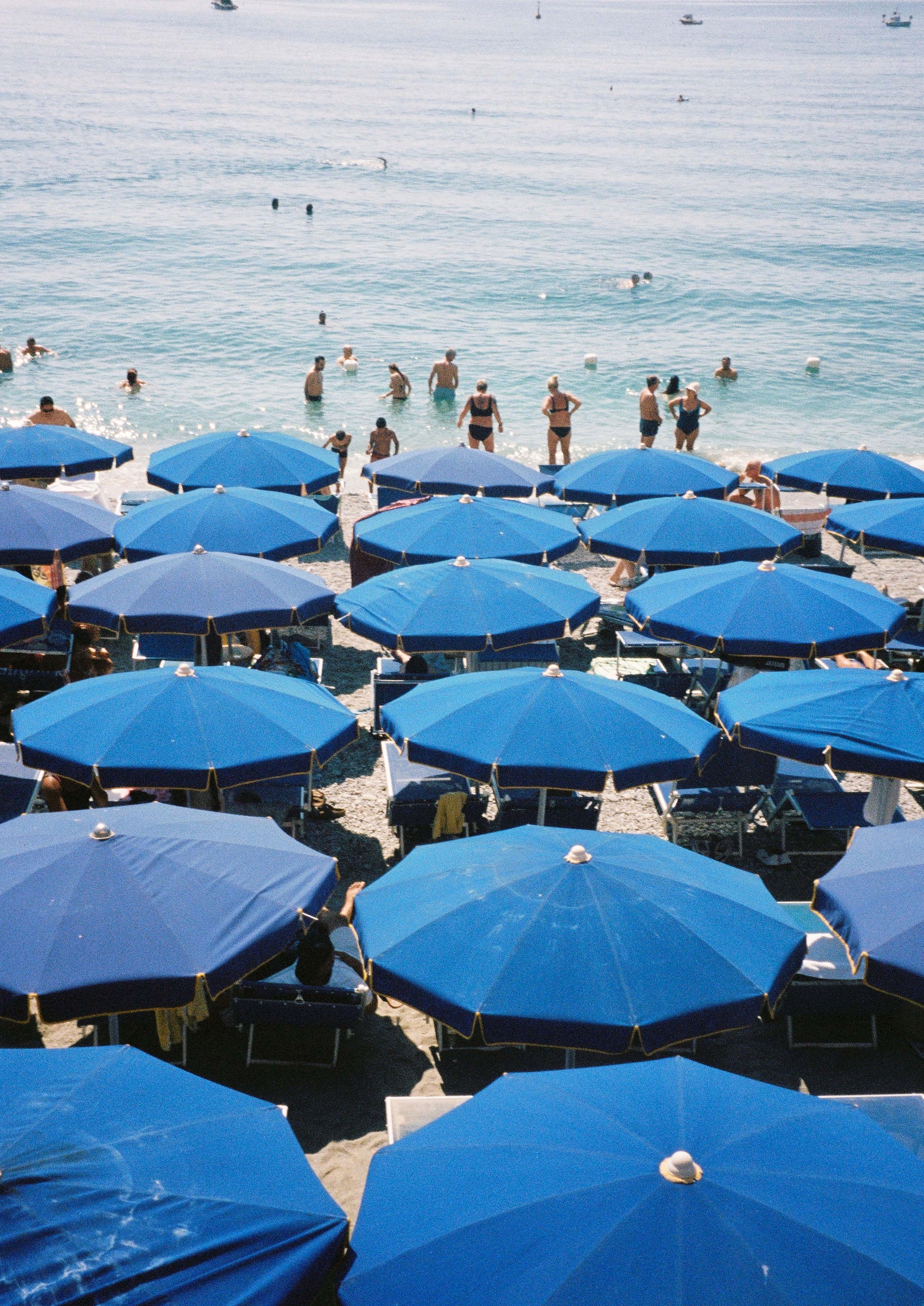 Fine art photograph titled “Blu Mediterraneo,” showcasing the deep, vivid blues of the Mediterranean Sea under a clear sky. This minimalist seascape captures the essence of southern Europe’s coastal serenity—perfect for calming, nautical, or contemporary interior design.