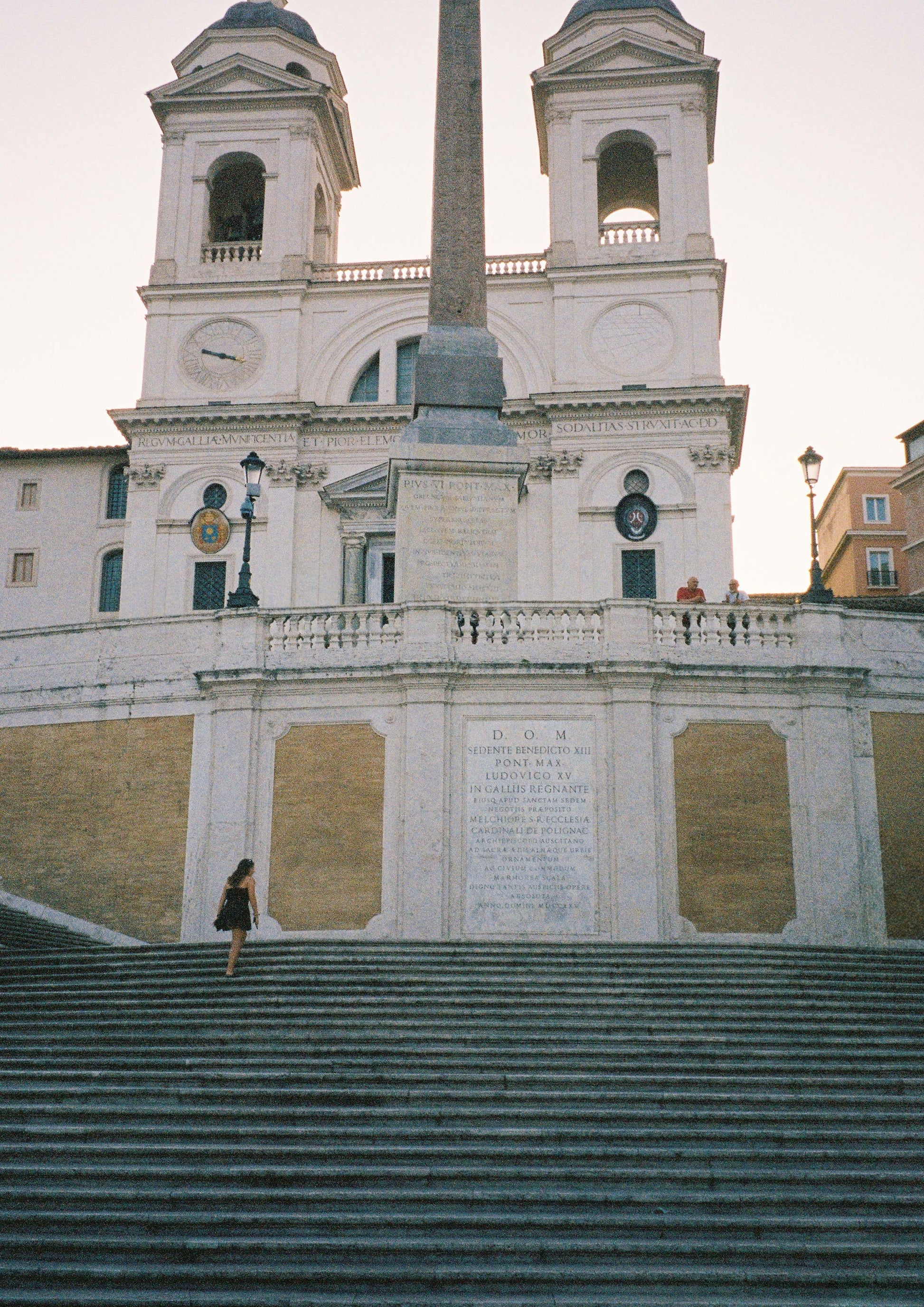 Fine art print of a sunlit stone staircase in a quiet Italian village, titled “La Scalinata.” Featuring warm textures, rustic architecture, and soft Mediterranean light, this image evokes a timeless, cinematic charm—ideal for classic, European-inspired interiors.