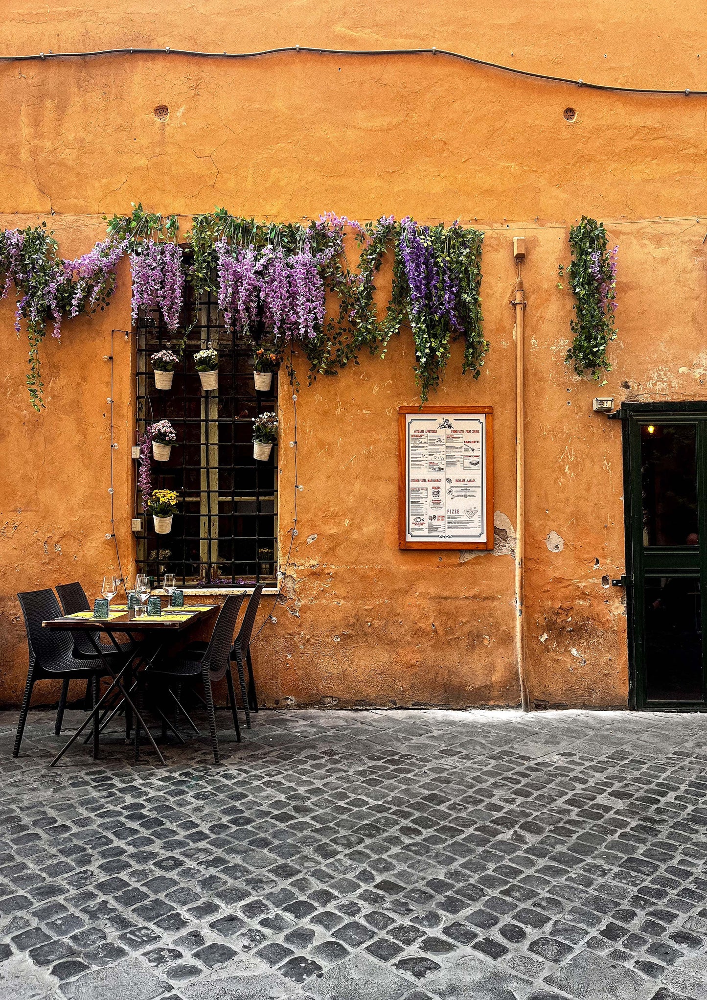Fine art photograph of Via Bocca di Leone in Rome, featuring cobbled streets, historic facades, and warm golden-hour tones. “Via Bocca di Leone” captures the quiet elegance of Roman backstreets—ideal for classic, European, or fashion-inspired interior design.