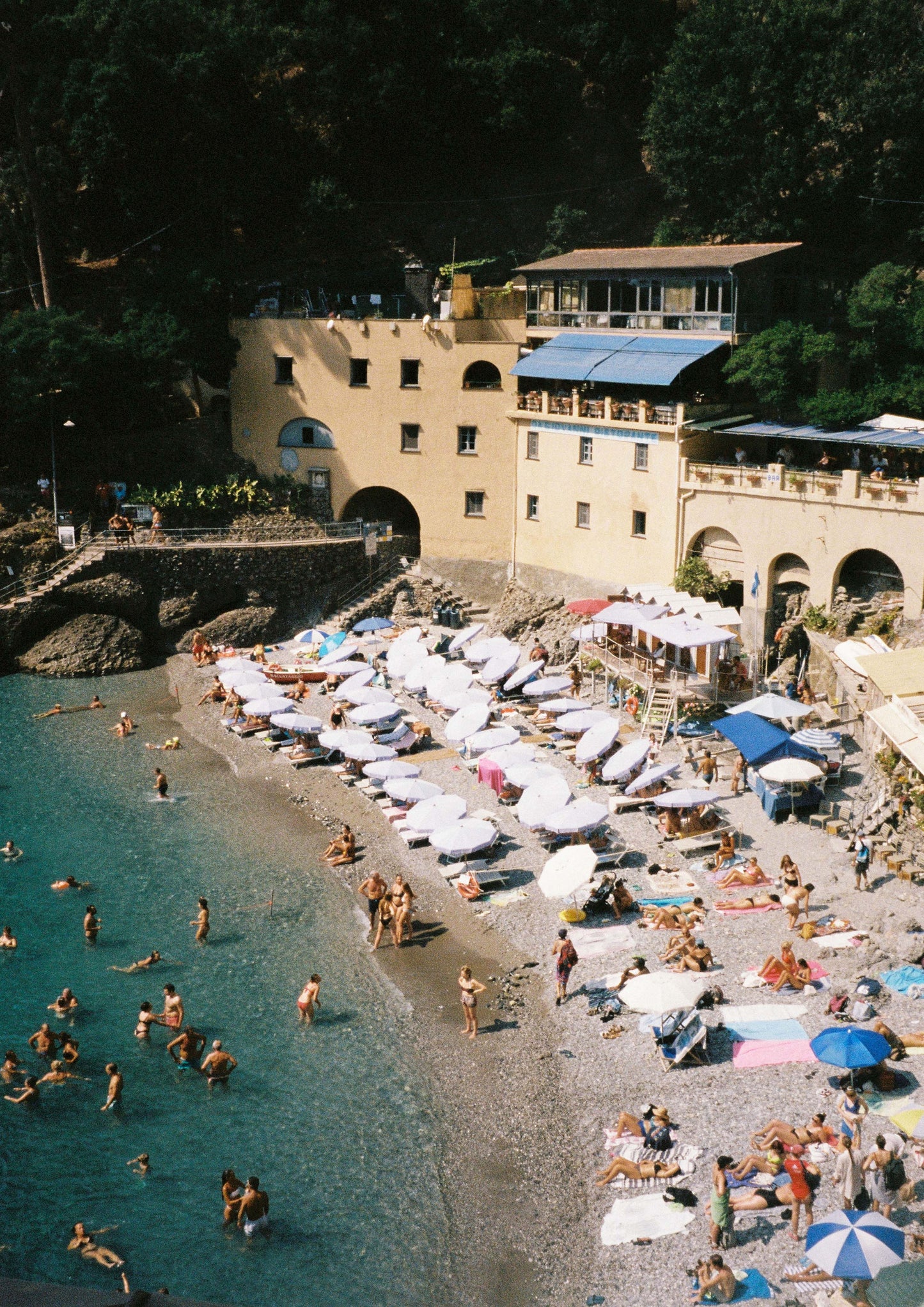 Fine art print titled “Baia Segreta,” featuring a secluded Italian cove with emerald waters, rugged cliffs, and untouched natural beauty. This hidden gem evokes a sense of escape and discovery—perfect for serene, nature-inspired, or Mediterranean coastal interiors.