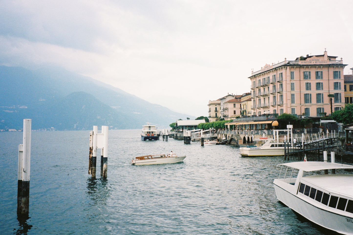 Elegant fine art photograph of Lake Como at golden hour, featuring soft pastel reflections on tranquil water and distant Alpine silhouettes. “Sfumature di Como” captures the refined serenity of Northern Italy, perfect for sophisticated, minimalist, or romantic home décor.